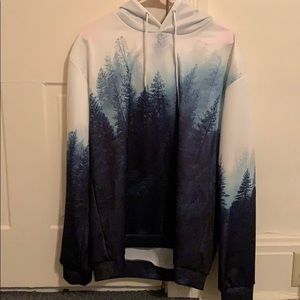 blue forest scene hoodie with front pocket